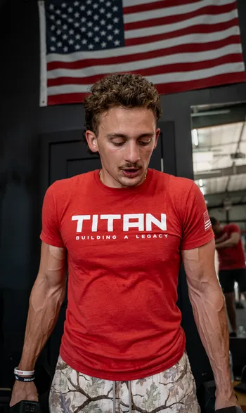A Titan Roofing team member training in the gym