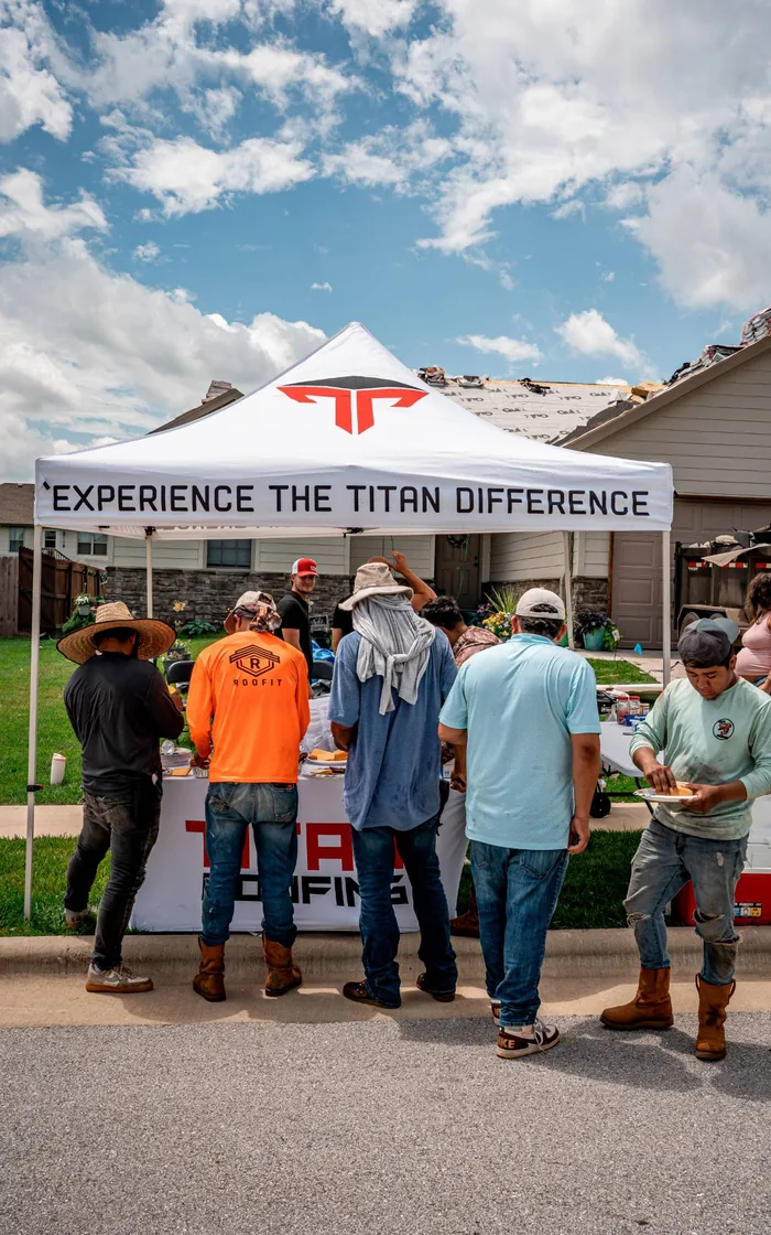 Crew lunch under the Titan tent on a job site