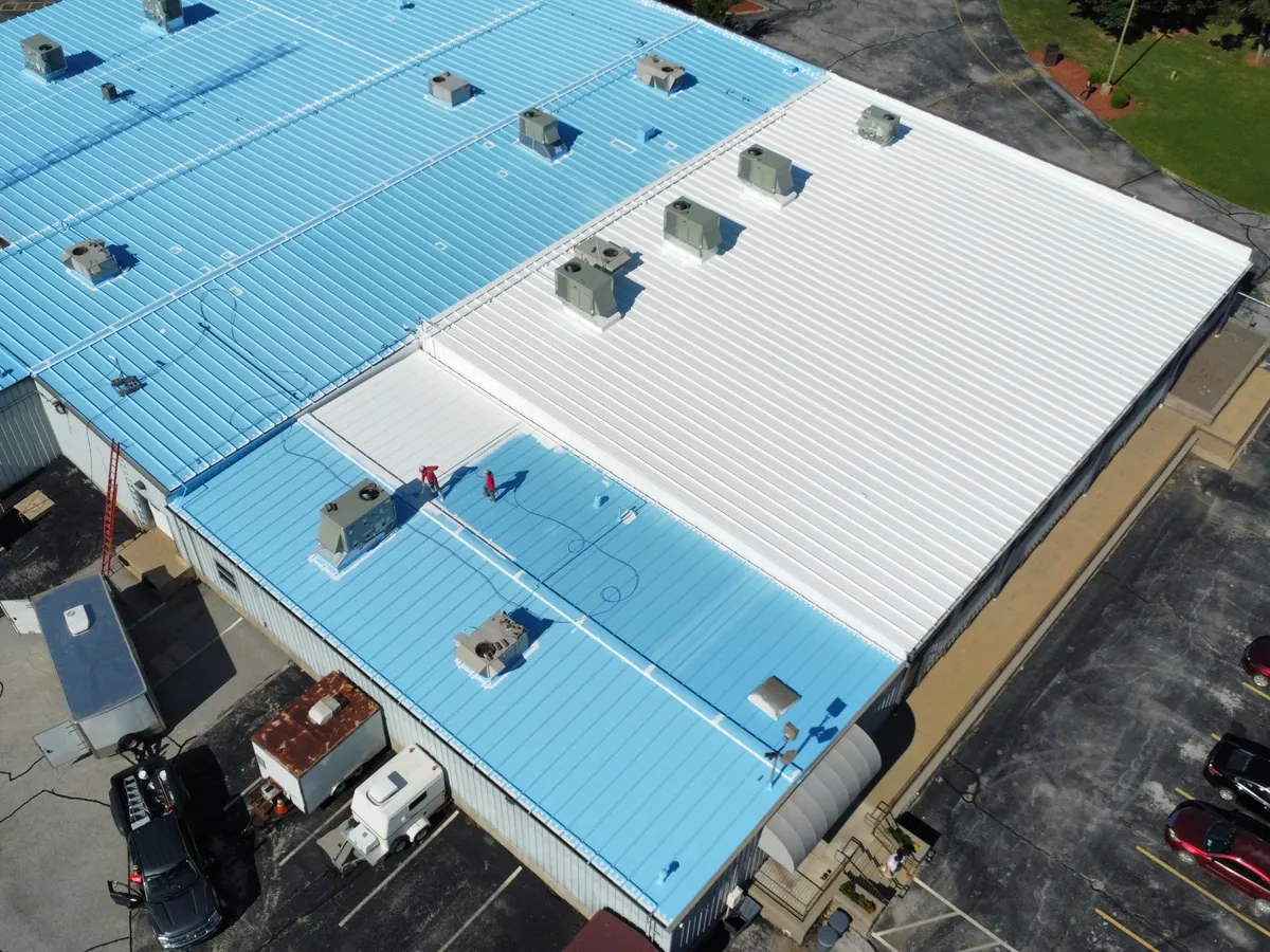 Commercial warehouse roof maintained by Titan Roofing