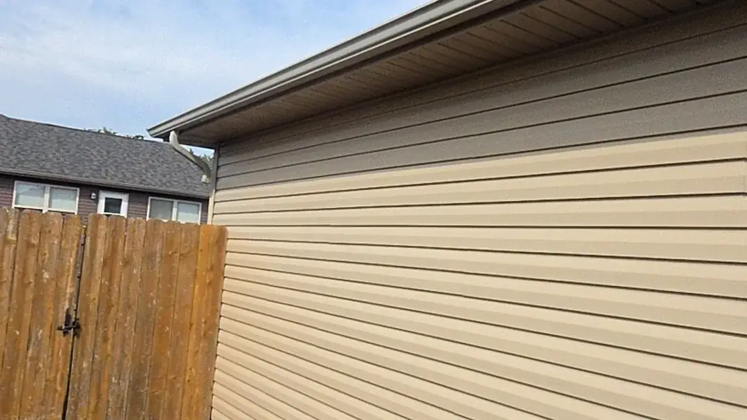 New tan lap siding and soffit on a Springfield home