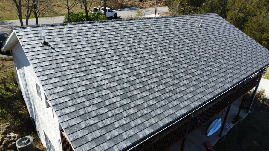 New gray synthetic slate roof on a two-story Missouri home