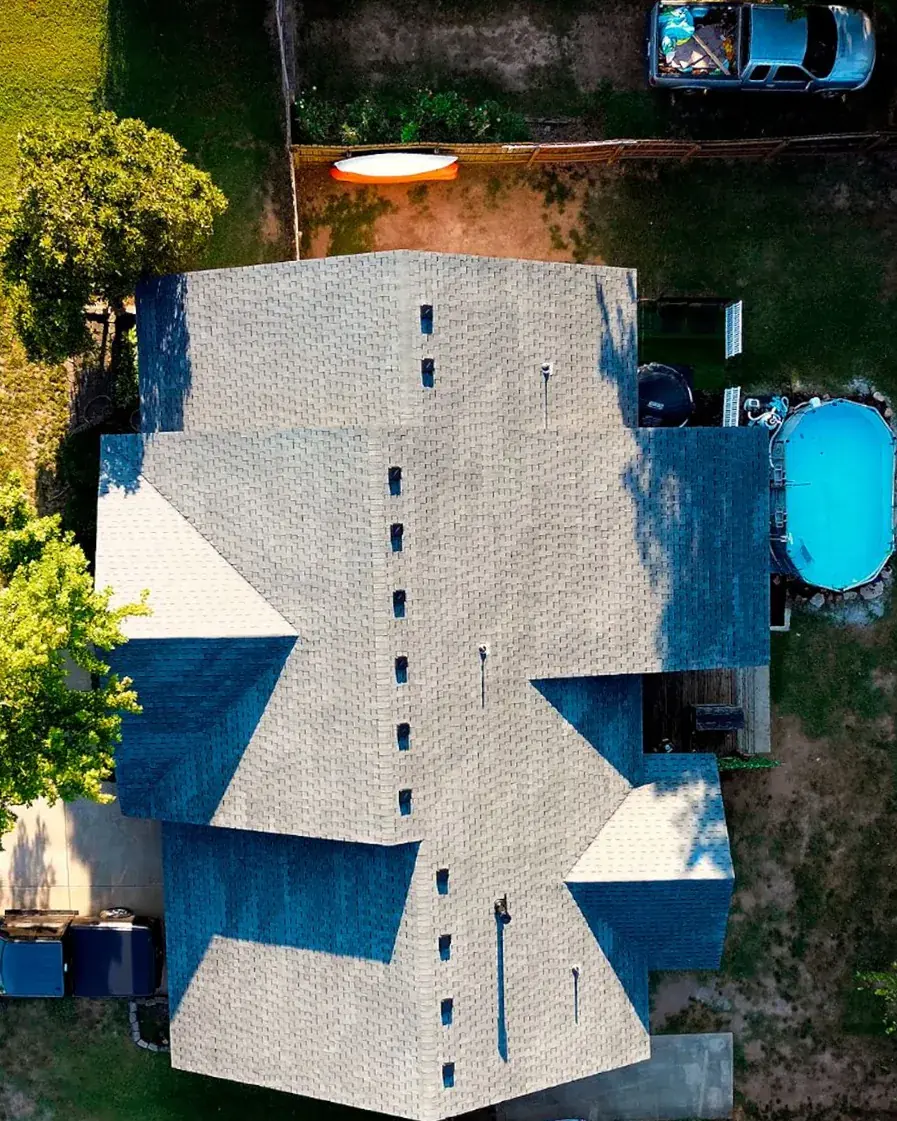The same home after Titan installed a new architectural shingle roof, seen from above