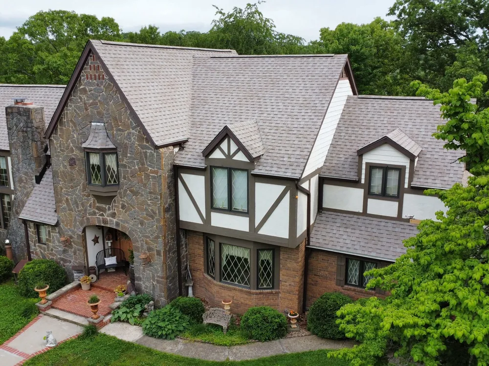 Tudor-style Missouri home with a new shingle roof