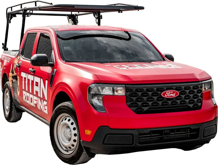 Titan Roofing's red wrapped work truck with a ladder rack